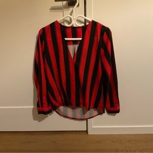 Red and black v neck blouse